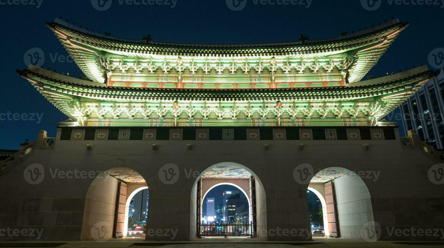 Illuminated Gwanghwamun Gate in night Seoul, South Korea photo