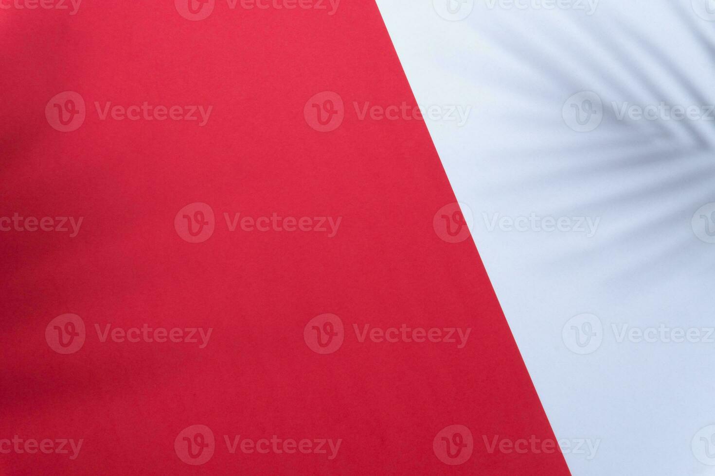 Red and white colors background with palm shadow photo