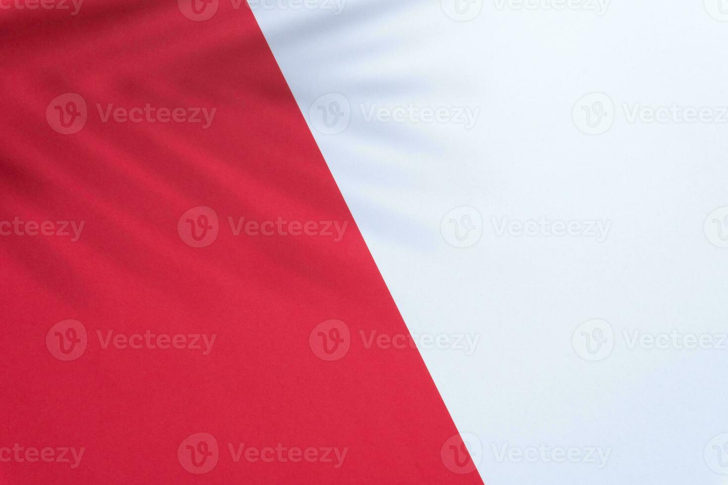 Red and white colors background with palm shadow photo