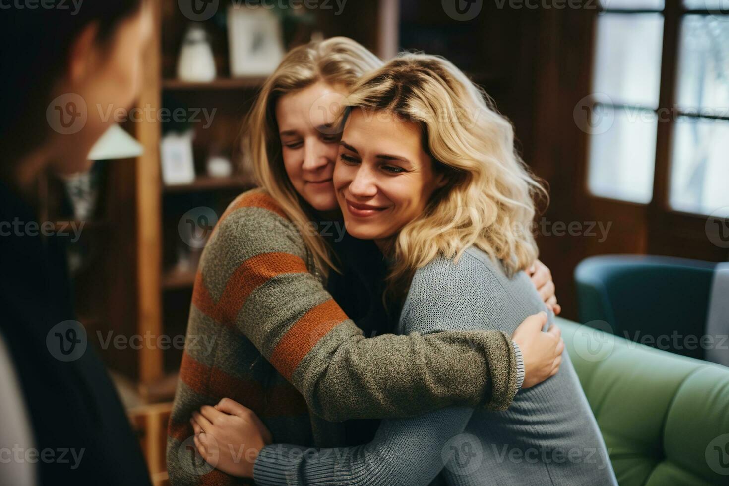 Two female friends in a therapist's office, sharing a hug of understanding and compassion after a breakthrough, demonstrating forgiveness and love AI Generative photo