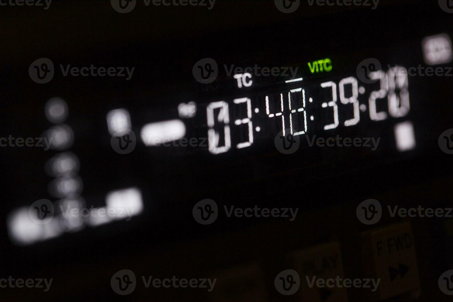 Timecode running on the professional video recorder. photo