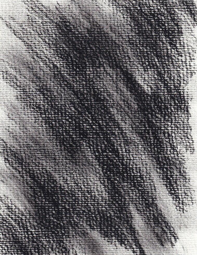 Black charcoal brush stroke texture. Rough sketches backdrop on a paper. photo