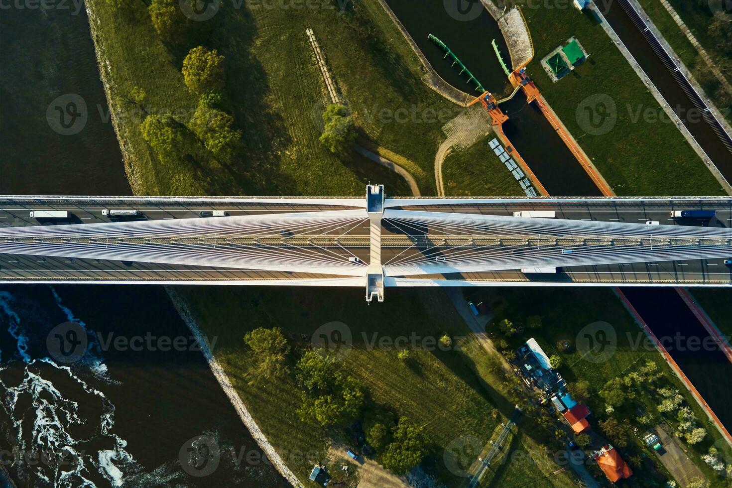 Large bridge over river with cars traffic photo