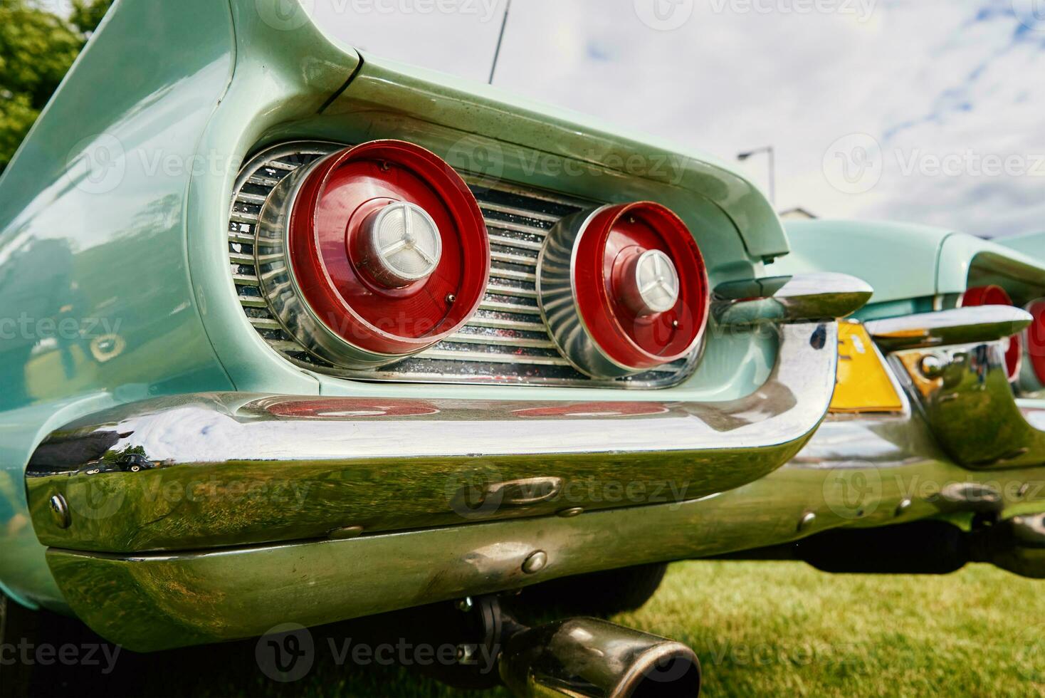 Red rear light of retro car photo