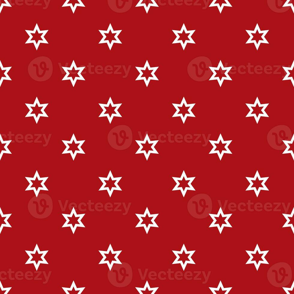 Seamless pattern of white stars on a red background photo