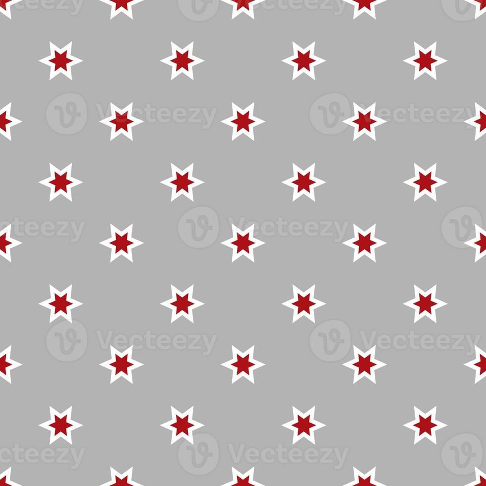 Seamless pattern of stars on a grey background photo