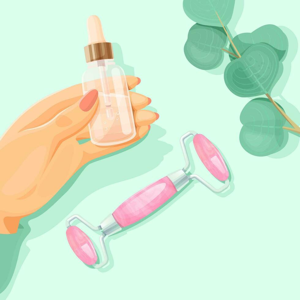 Female hand holding serum bottle over table with face massage roller and a sprig of eucalyptus. vector