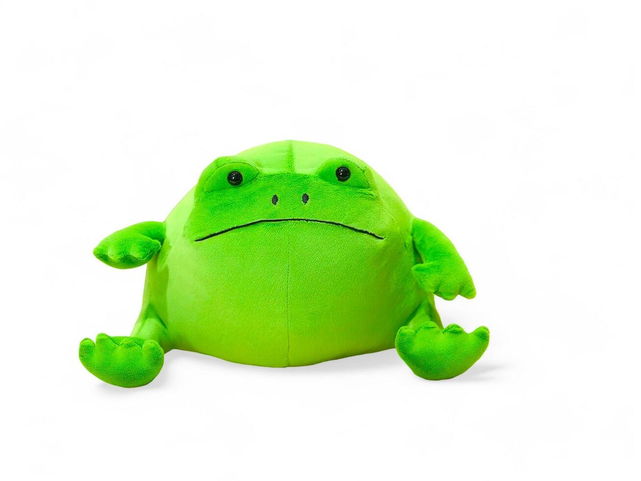 Green frog doll isolated on white photo
