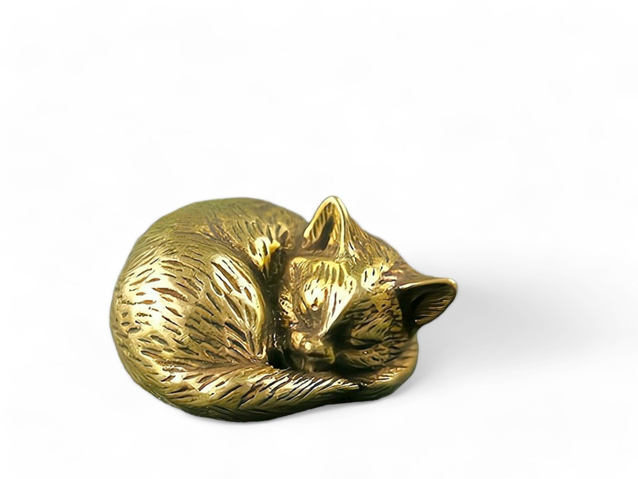 sleeping cat black gold animal statue on white background 27953991