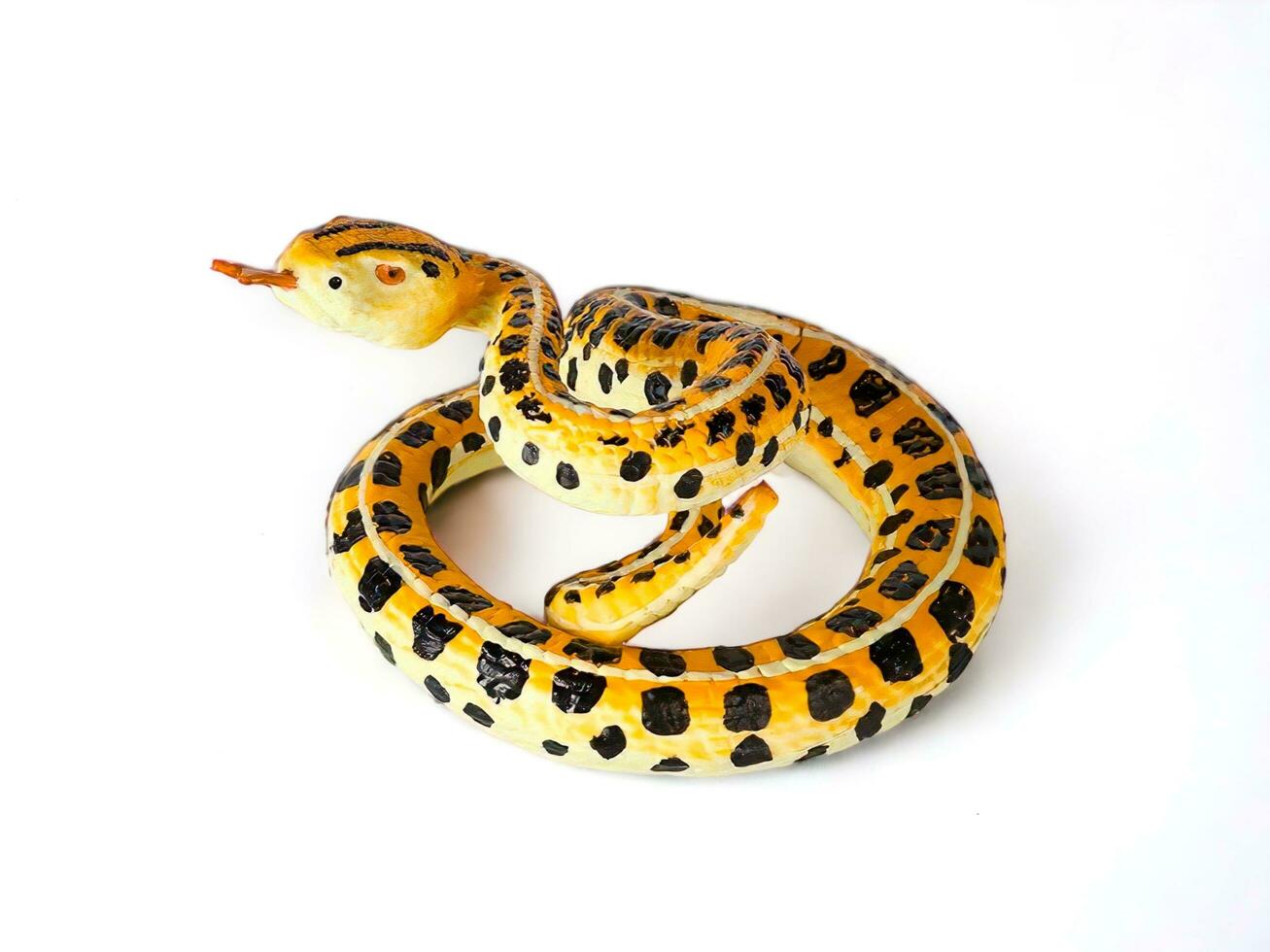 Yellow snake with black spots miniature animal isolated on white photo