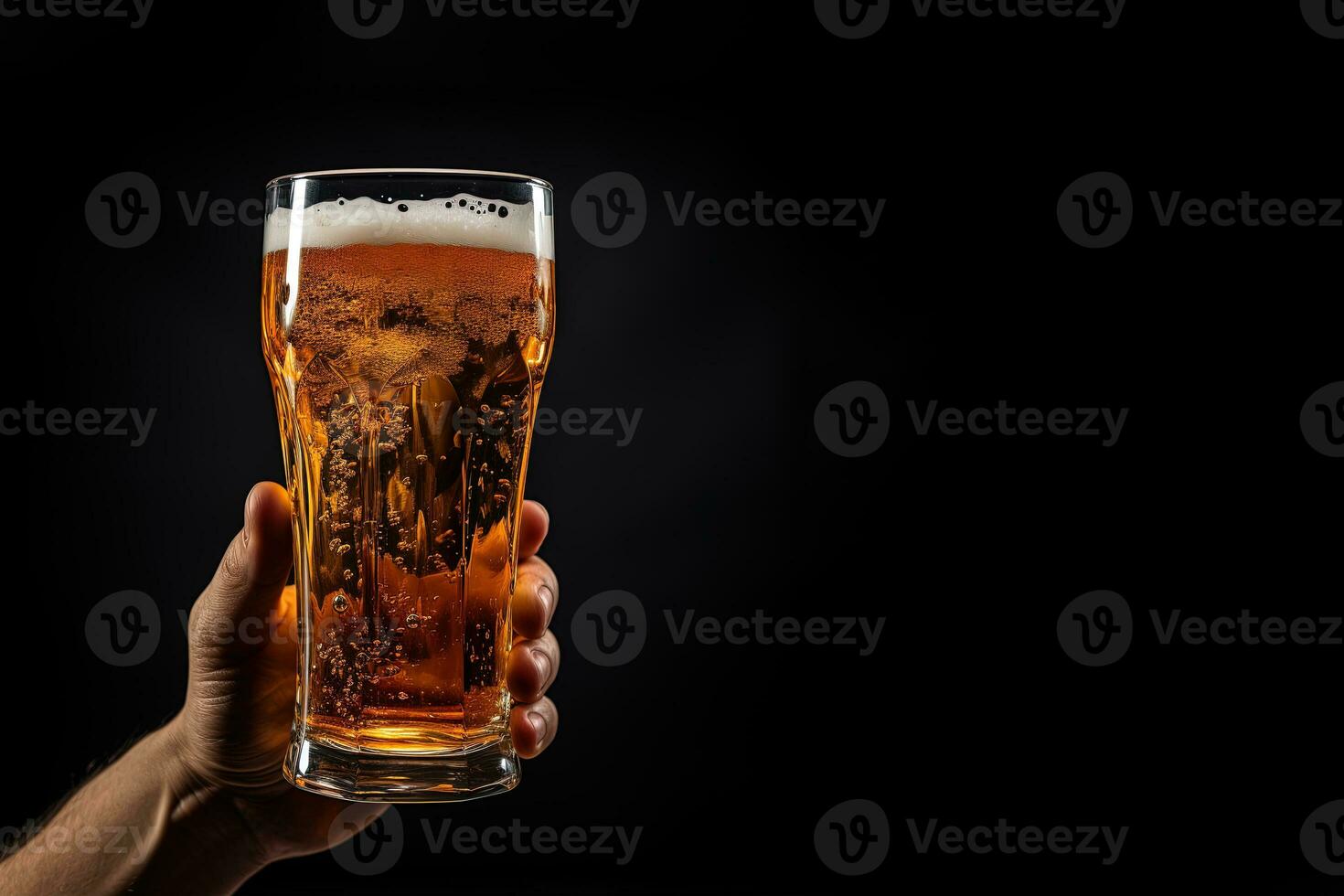 a male hand holding up a glass of beer isolated on a black background with copy space. ai generated photo