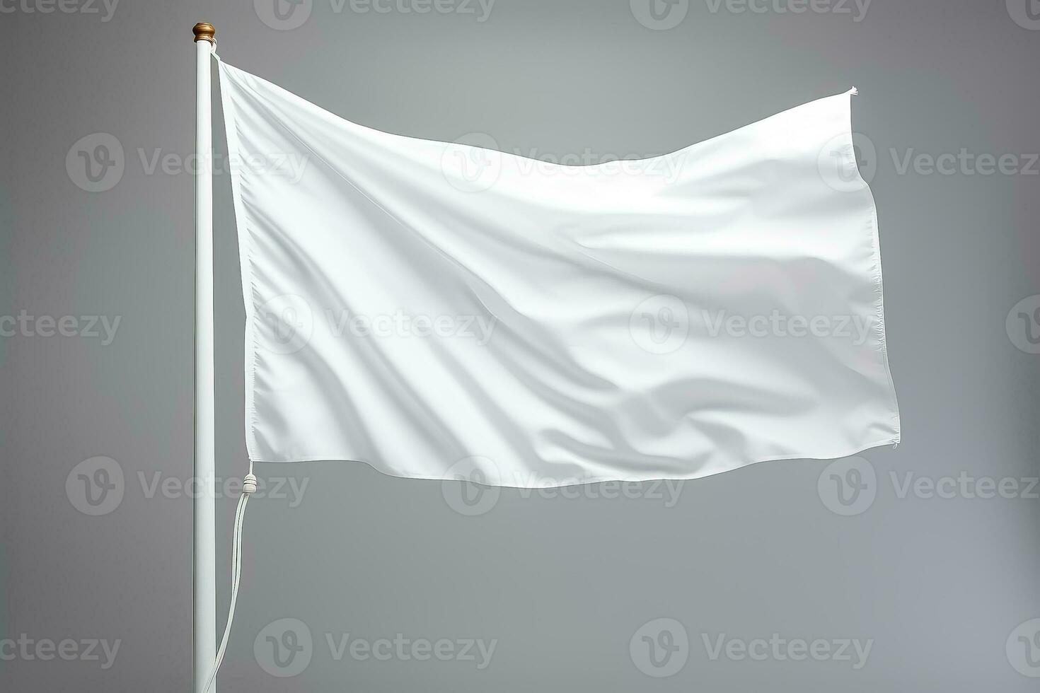 Closeup of a white flag waving on a flagpole against a gray background isolated photo