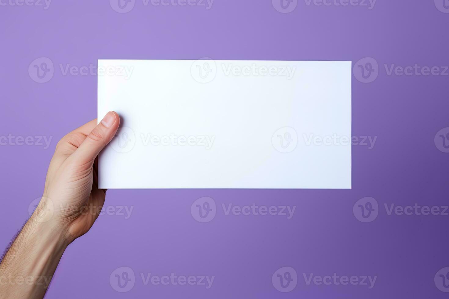 A human hand holding a blank sheet of white paper or card isolated on purple background. ai generated photo