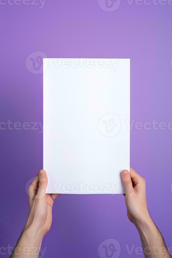 A human hand holding a blank sheet of white paper or card isolated on purple background. ai generated photo