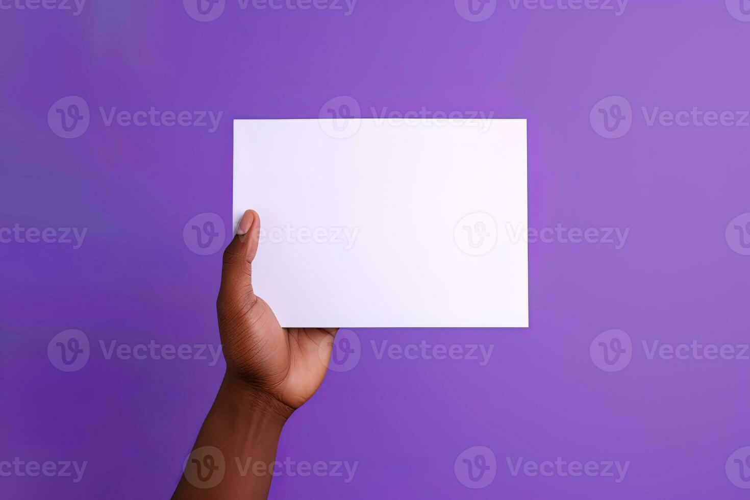 A human hand holding a blank sheet of white paper or card isolated on purple background. ai generated photo