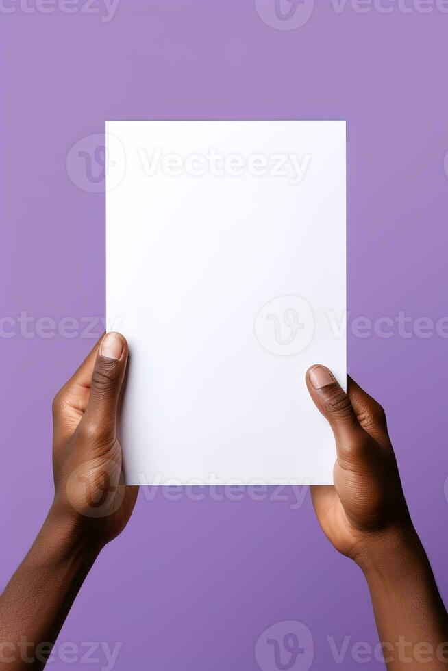 A human hand holding a blank sheet of white paper or card isolated on purple background. ai generated photo