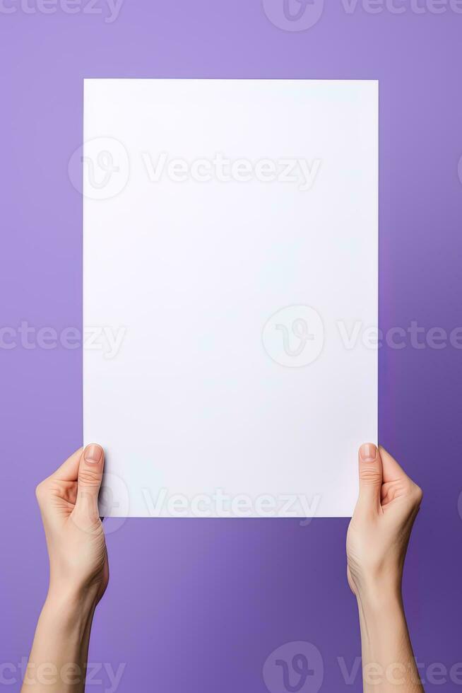 A human hand holding a blank sheet of white paper or card isolated on purple background. ai generated photo