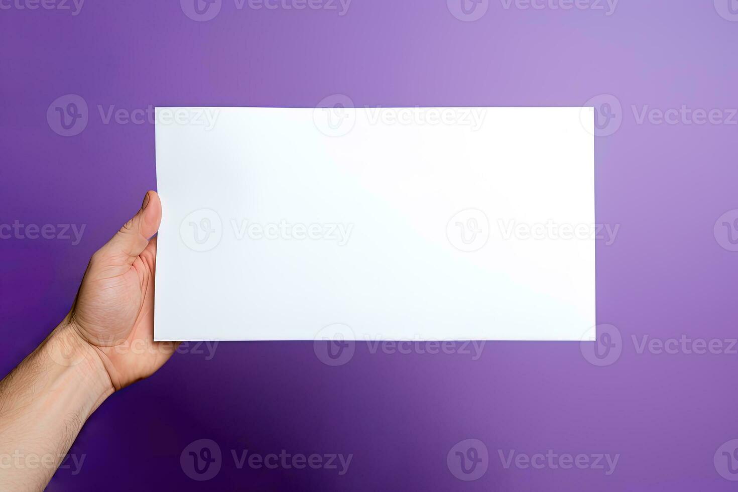 A human hand holding a blank sheet of white paper or card isolated on purple background. ai generated photo