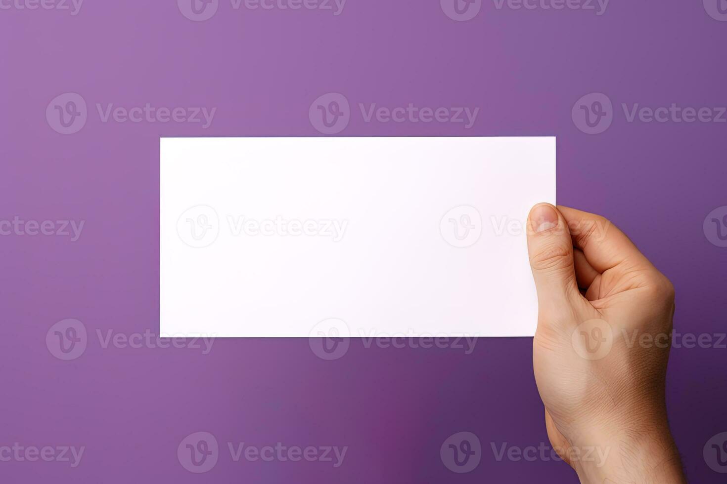 A human hand holding a blank sheet of white paper or card isolated on purple background. ai generated photo