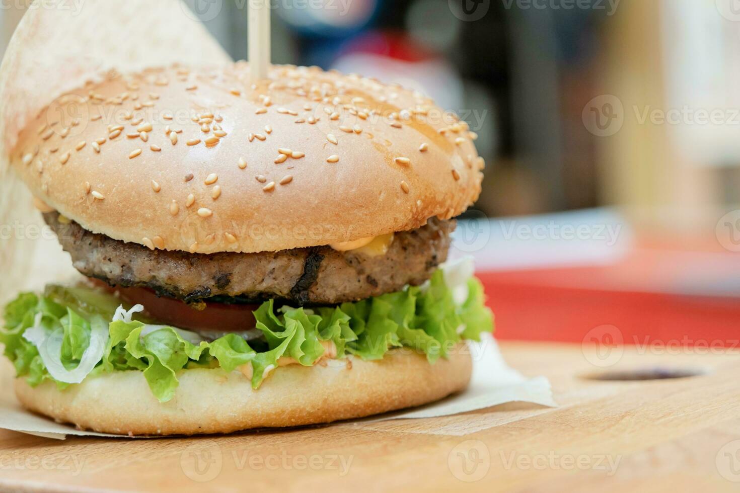 eating delicious burger at the cafe photo