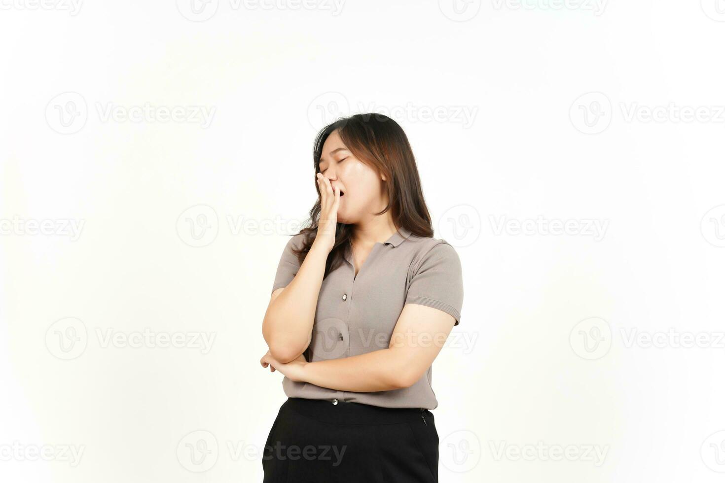 Yawning Gesture Of Beautiful Asian Woman Isolated On White Background photo