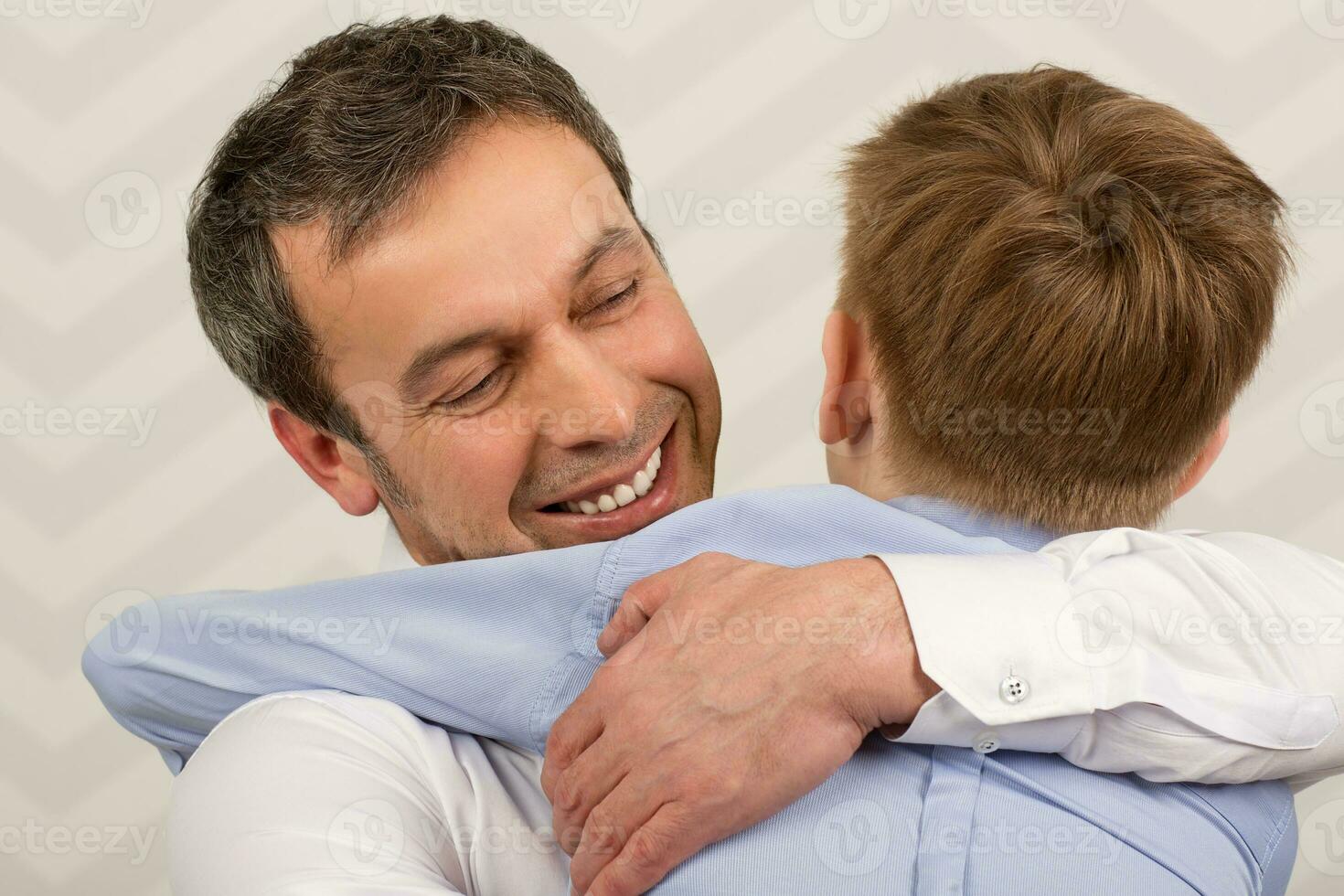 Father giving hugs to dear son photo