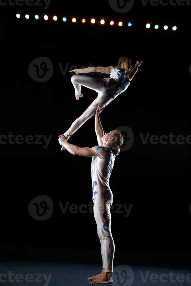 Circus artists perform different tricks. photo