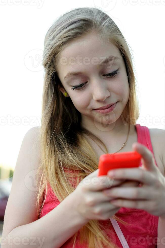 Young girl sending a message photo