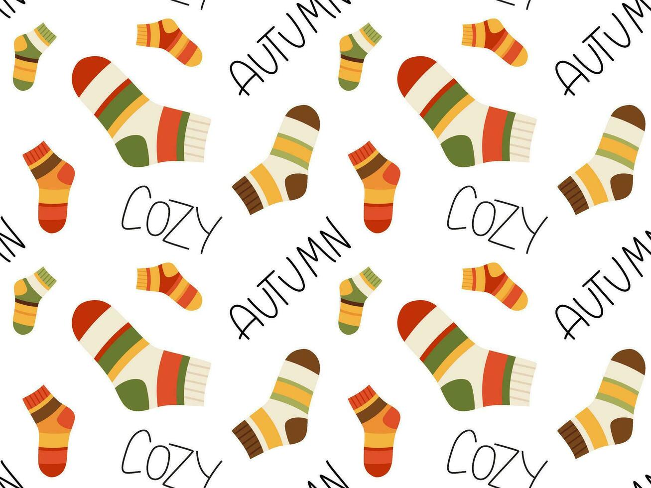 Seamless pattern of socks and handwritten cozy. Vector illustration
