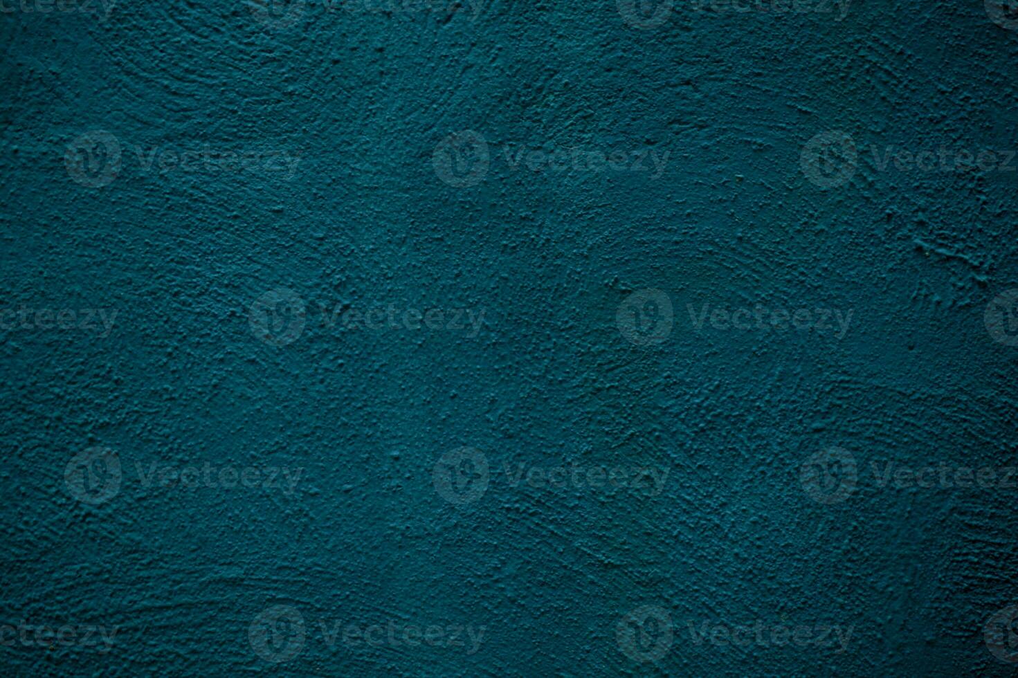 Rough textured painted blue wall background photo