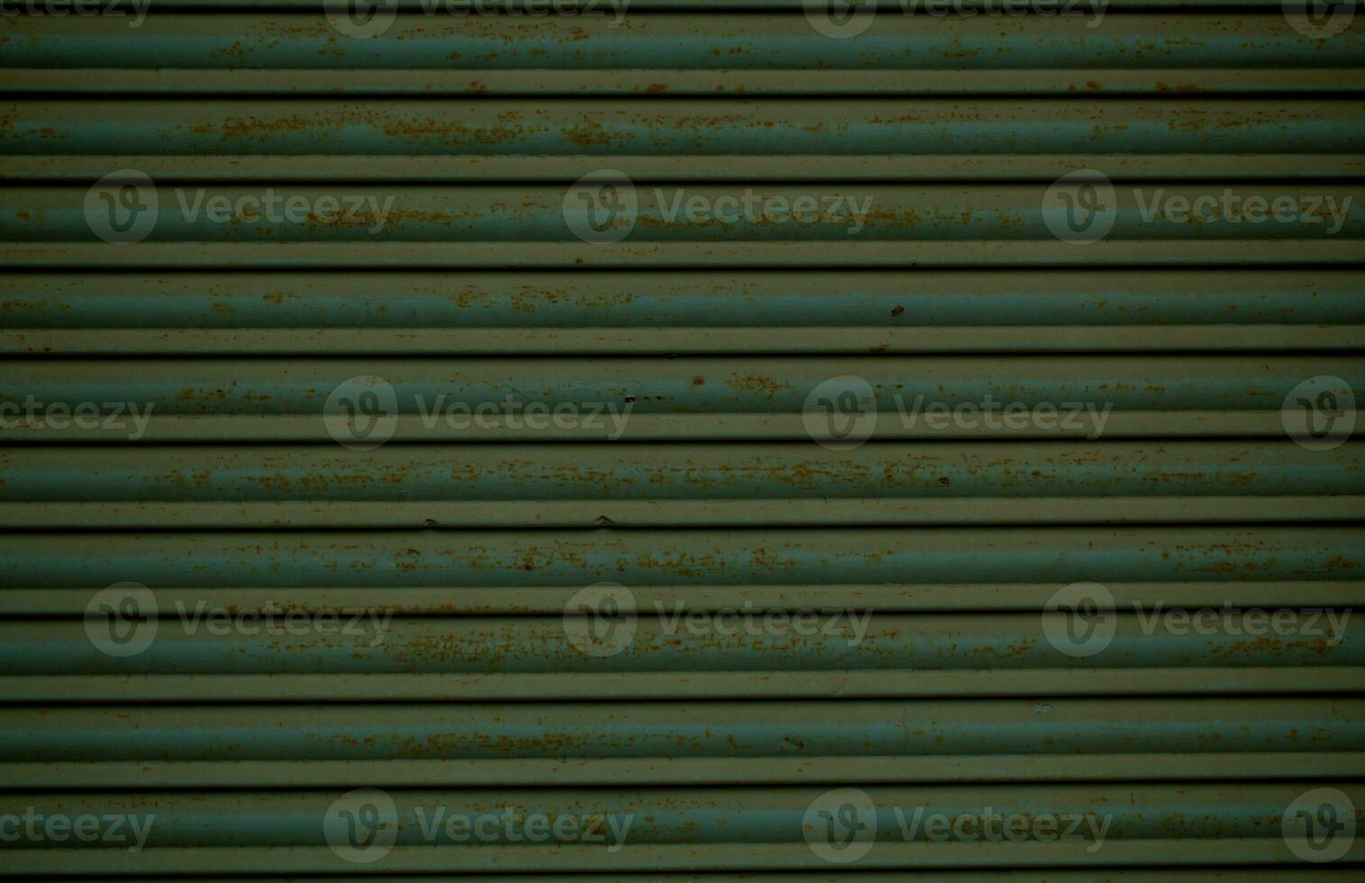 Old rusting metal security shutters texture photo