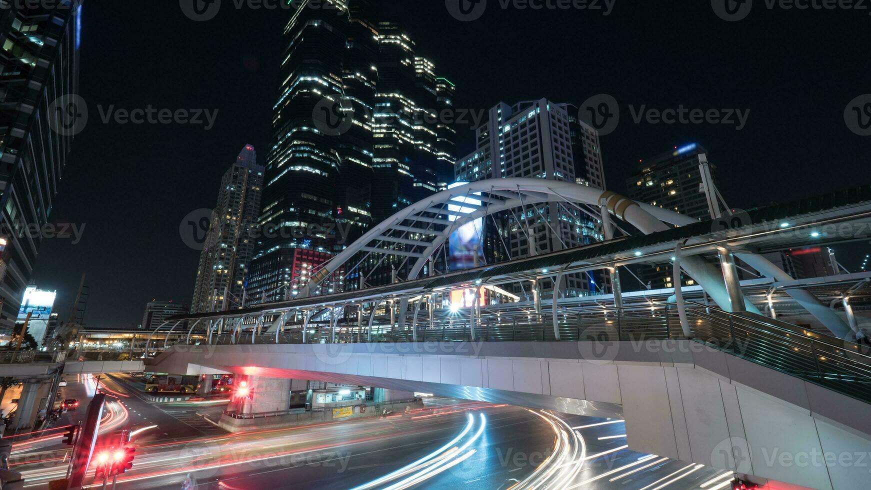 Road and pedestrian overpass in night Bangkok photo