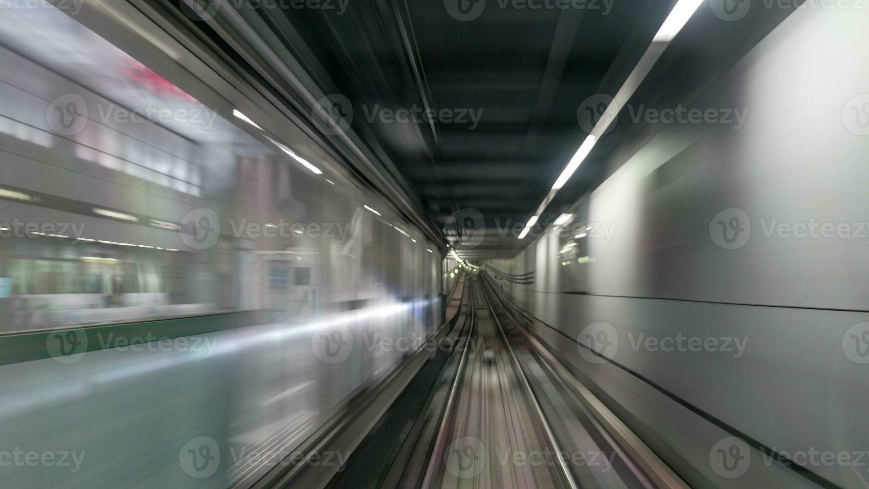 Moving subway train photo