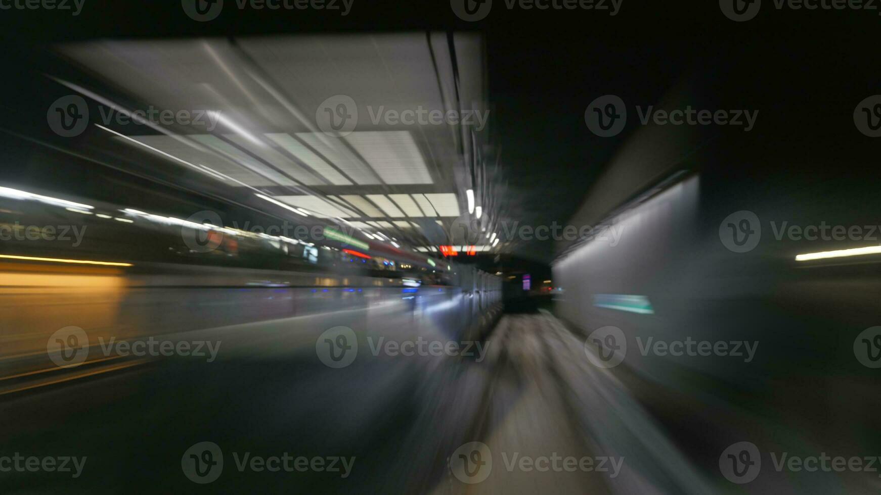 Reflection of subway tunnel in train's window photo
