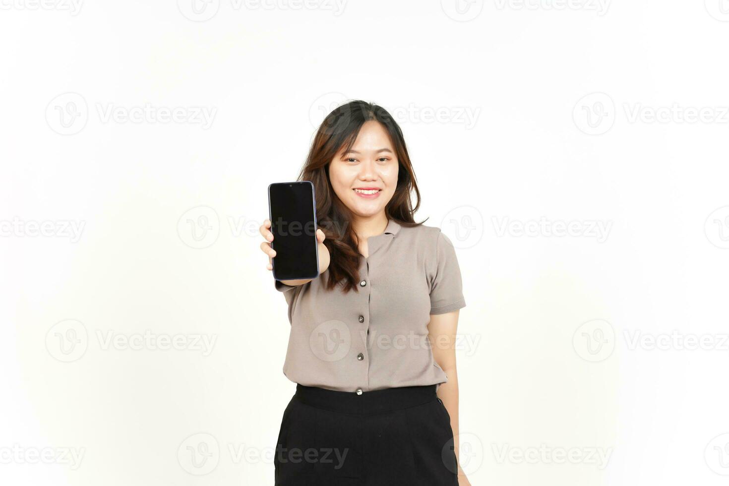 Showing Apps or Ads On Blank Screen Smartphone Of Beautiful Asian Woman Isolated On White Background photo