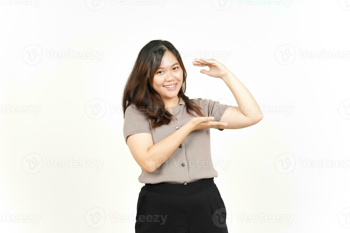 Measuring and Showing or Holding Big Sign Of Beautiful Asian Woman Isolated On White Background photo