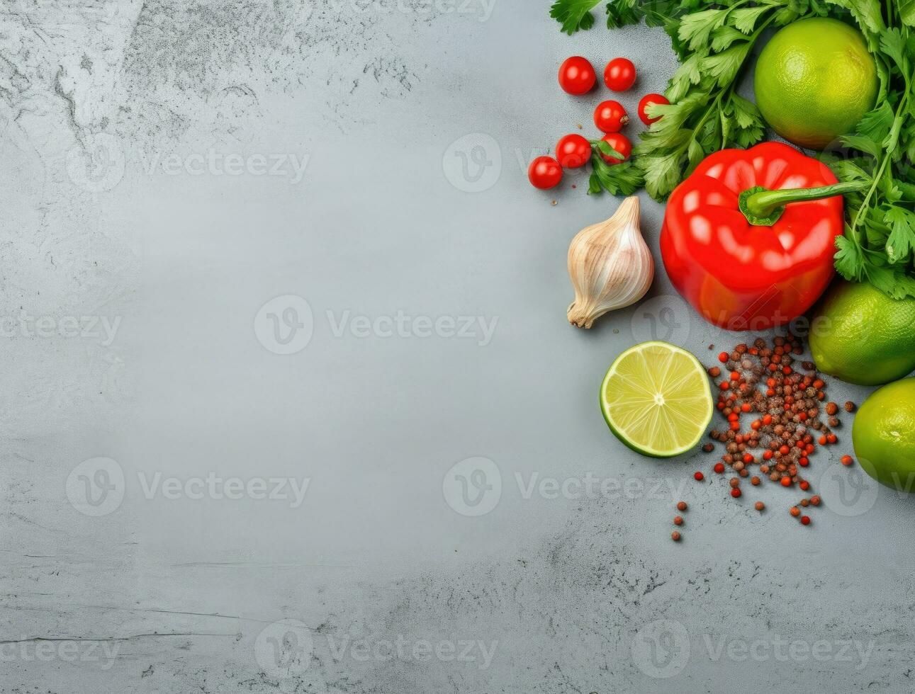 Fresh vegetables and spices on grey background. Top view with copy space photo