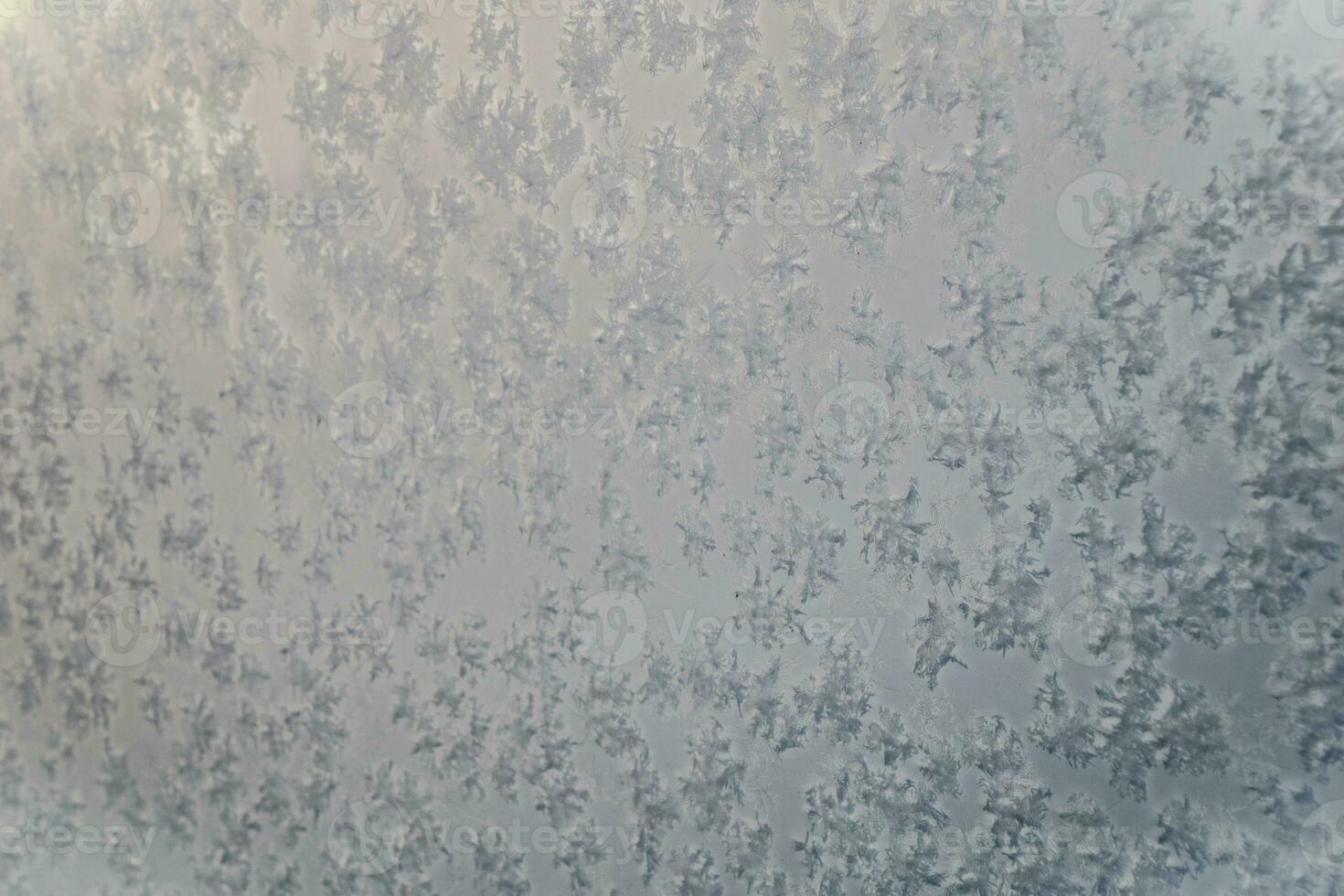 original winter interesting abstract background painted with snow and frost photo