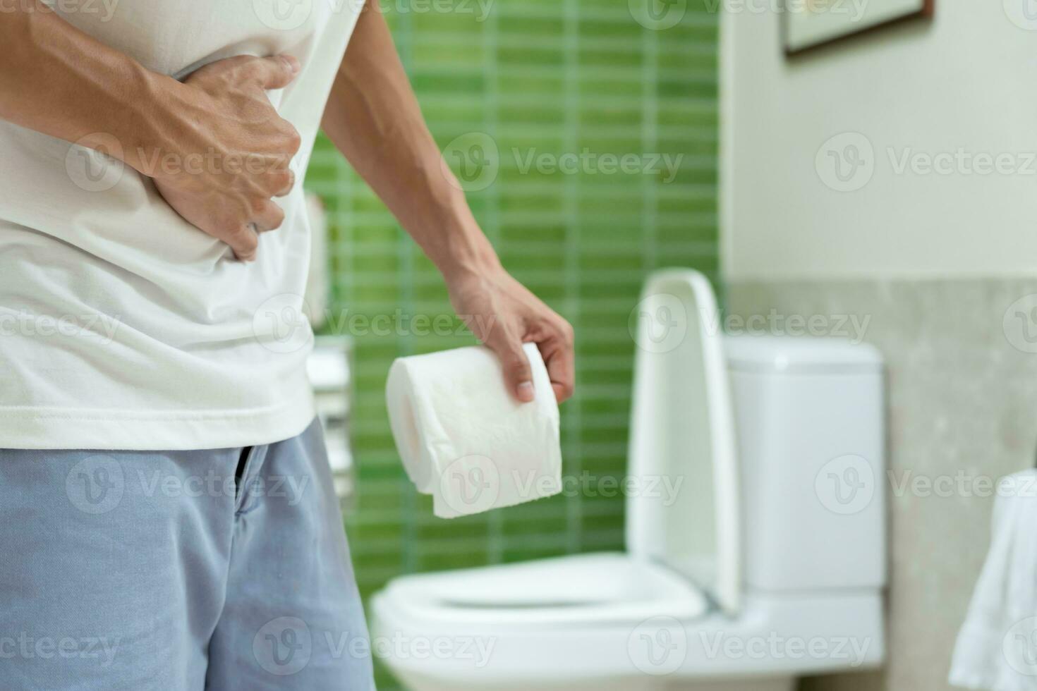 stomach ache. Asian men have abdominal pain, indigestion, gastritis, menstrual cramps, flatulence, diarrhea, distention, colon cancer, belly inflammation problem, suffer food poisoning, abdomen photo