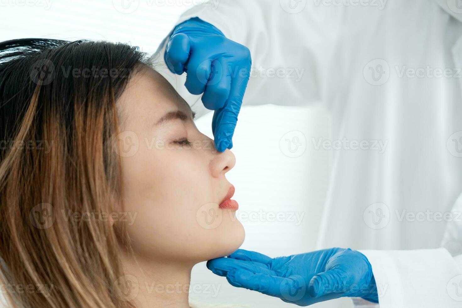 plastic surgery, beauty, Surgeon or beautician touching woman face, surgical procedure that involve altering shape of nose, doctor injection to prepare for rhinoplasty, medical assistance, health photo