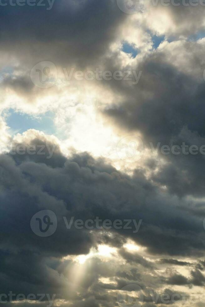 High Angle Footage of Most Beautiful Natural Orange Sunset with Orange Clouds and Sky over Luton City of England UK. Image Was Captured with drone's Camera on August 19th, 2023 photo