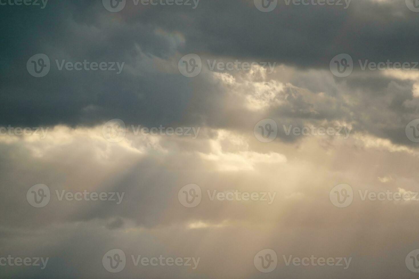 High Angle Footage of Most Beautiful Natural Orange Sunset with Orange Clouds and Sky over Luton City of England UK. Image Was Captured with drone's Camera on August 19th, 2023 photo