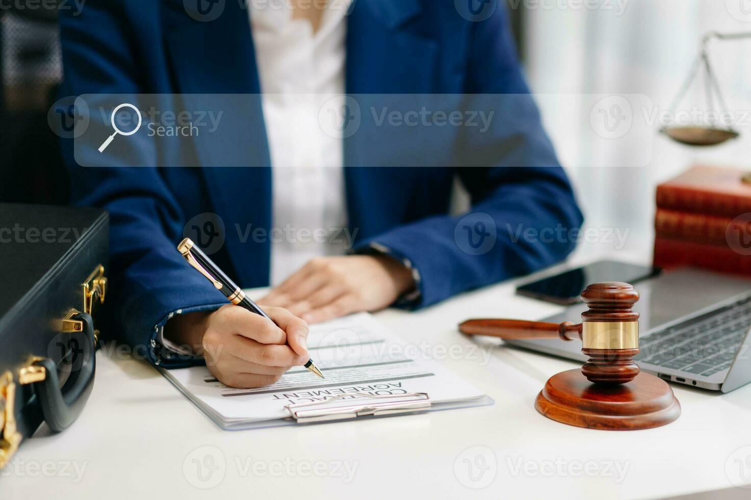 Searching Browsing Internet Data Information Networking Concept with blank search bar.justice and law concept.Male judge in a courtroom with the gavel,working with digital tablet computer. photo