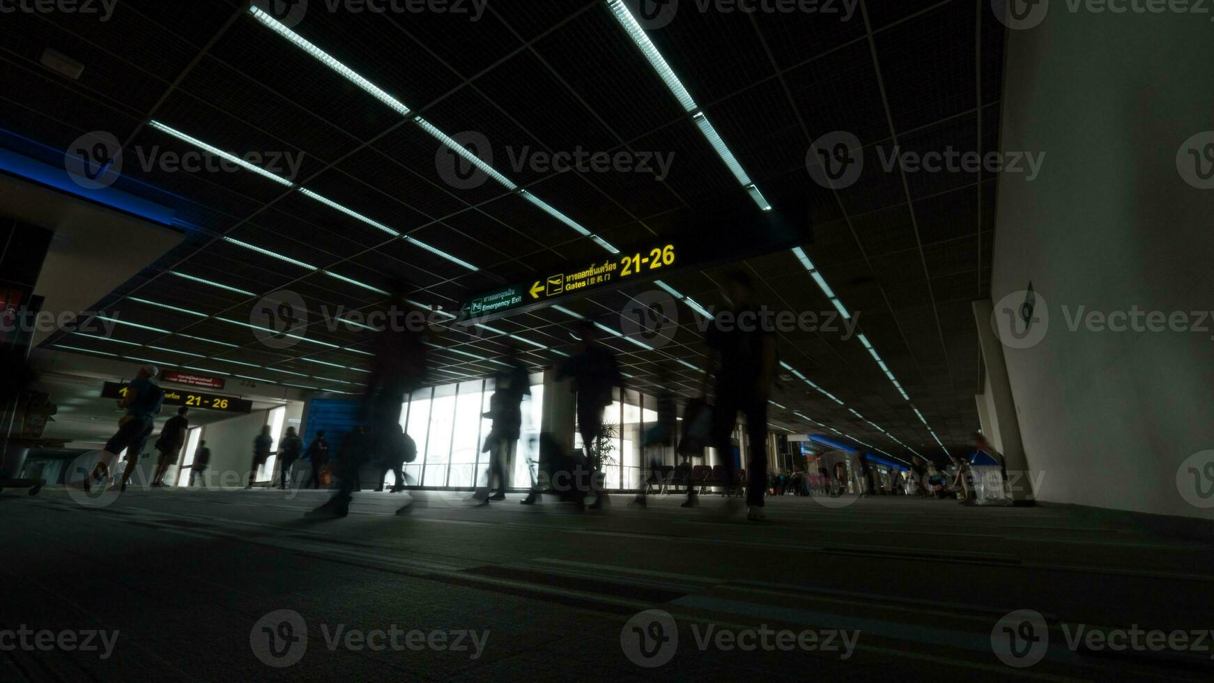 People traffic in the airport terminal photo