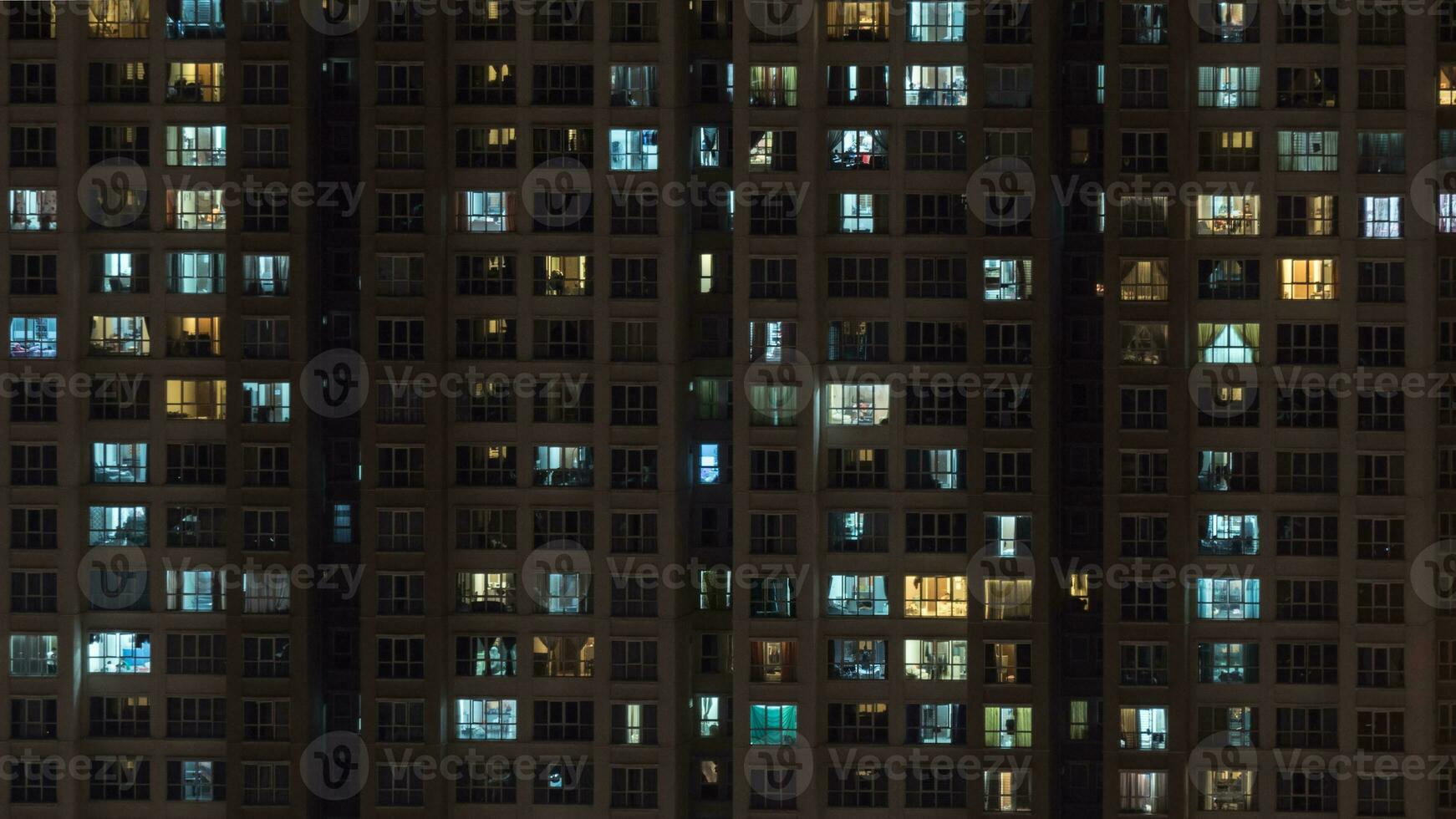 High-rise apartment block at night photo