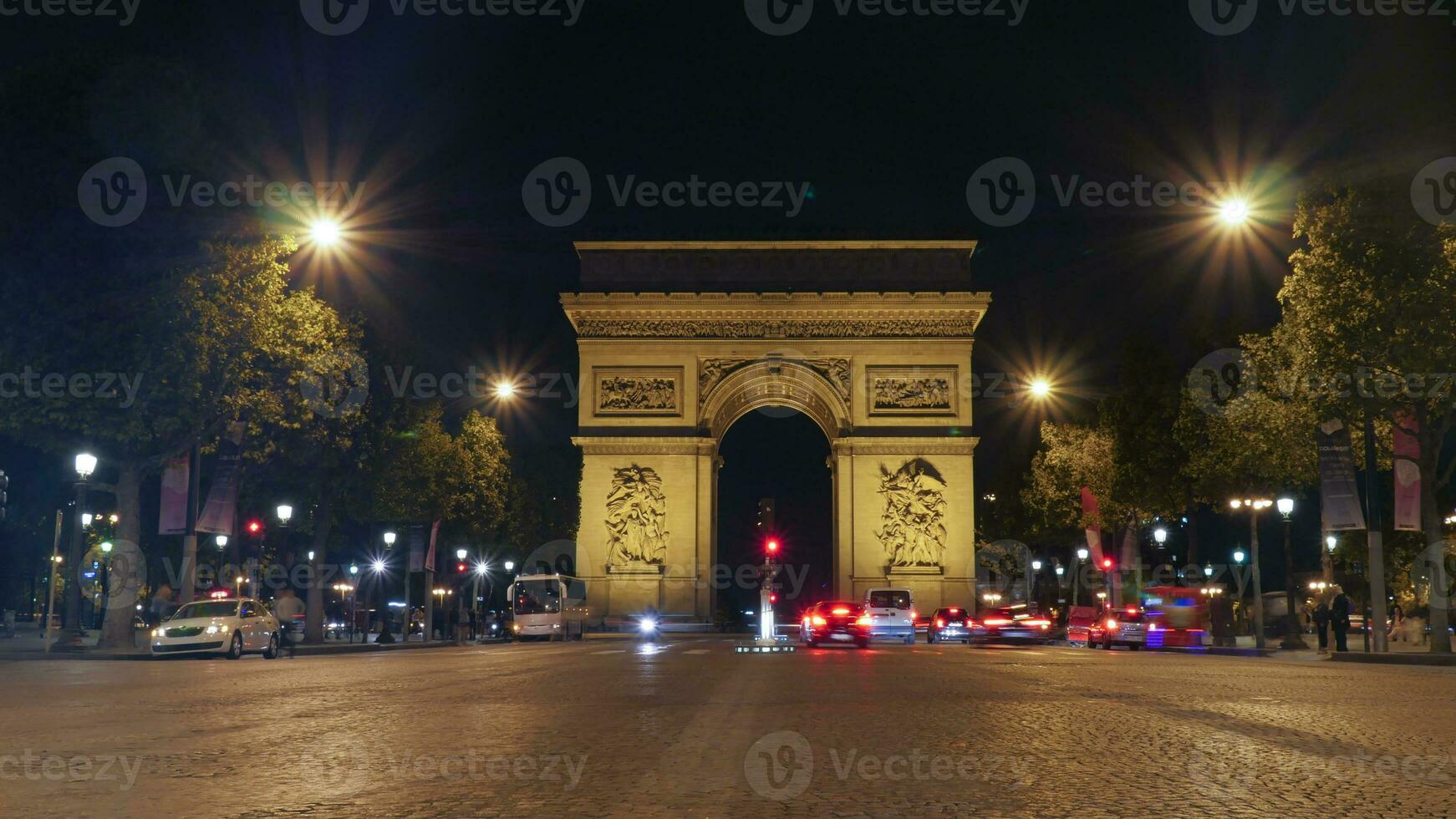 Arc de Triomphe, Paris illuminated at night photo