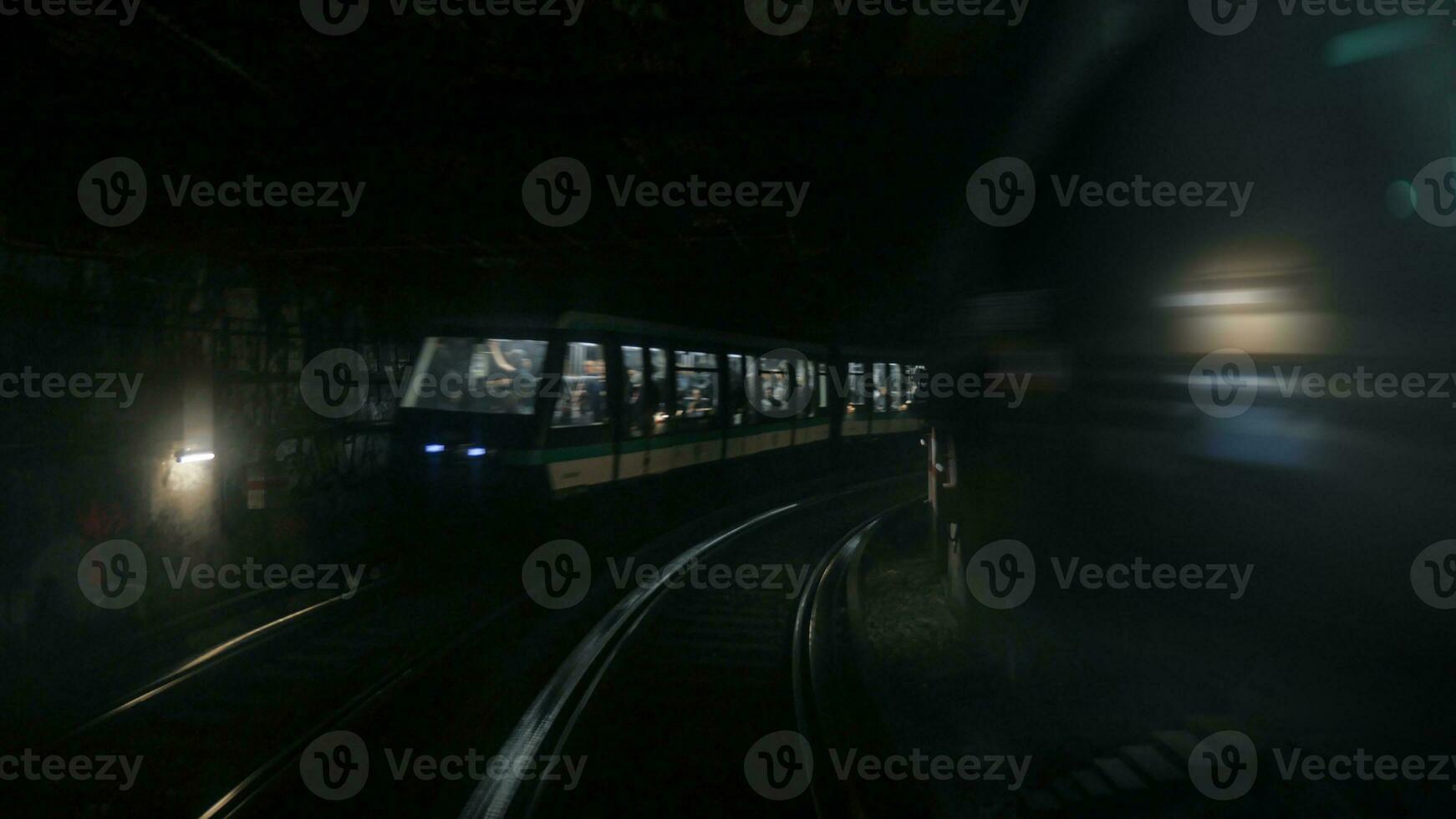 Paris train moving toward end of tunnel photo