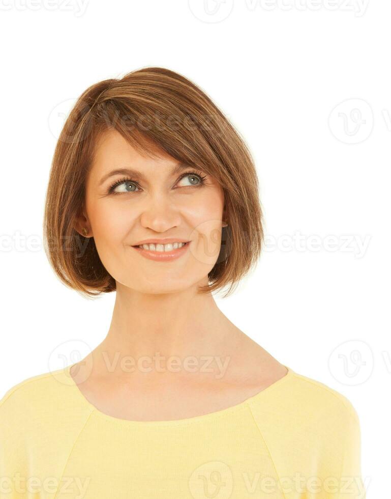 Elegant adult woman looking up and smiling photo