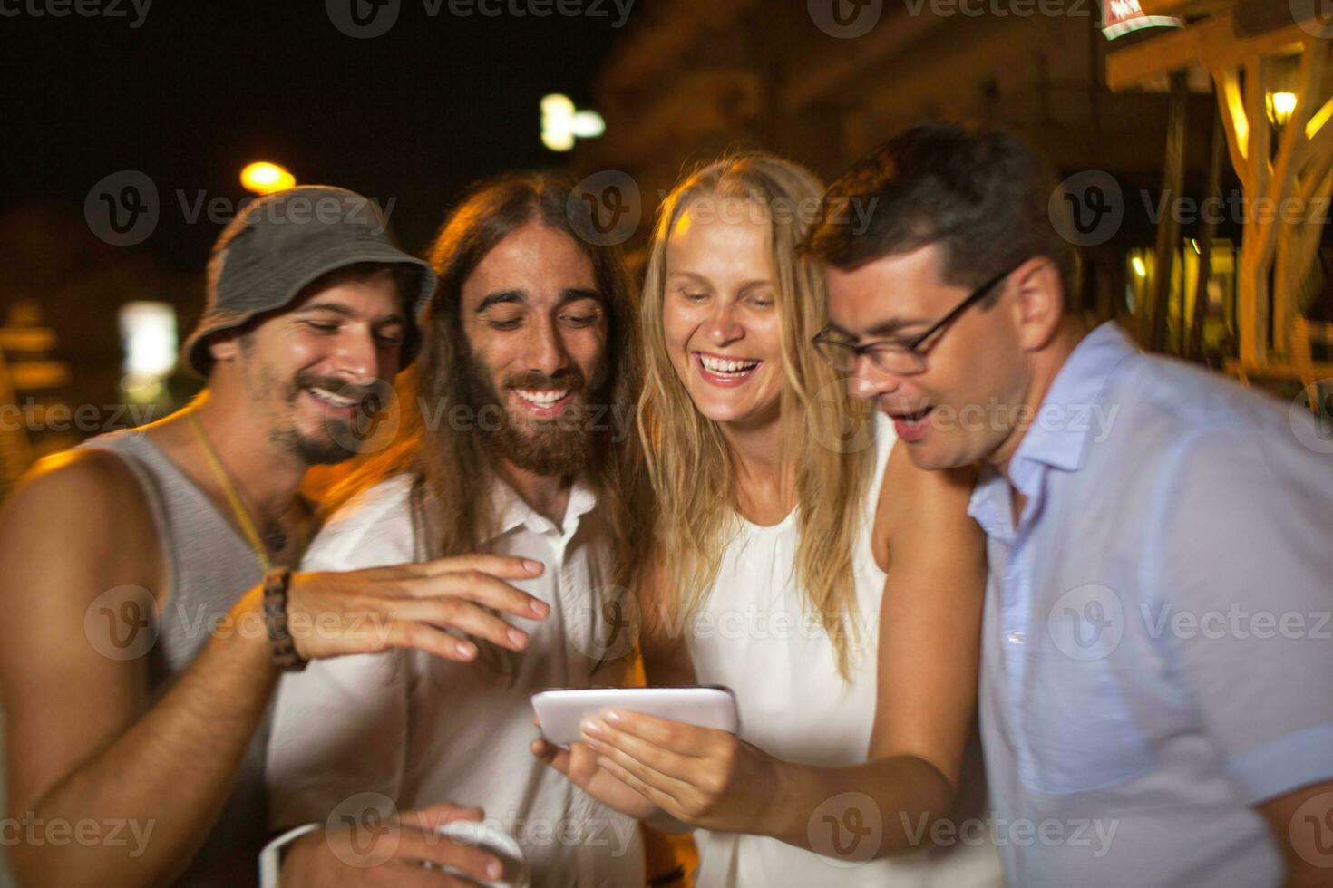 Friends looking at great shots of today evening photo