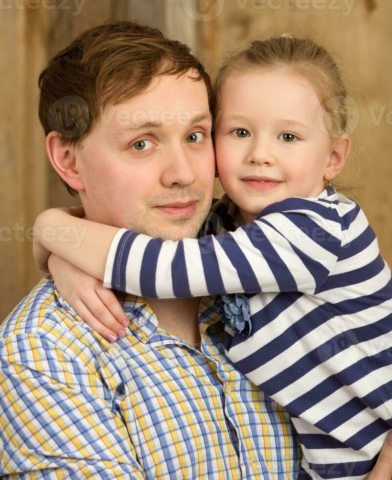 Portrait of father and beautiful little daughter photo